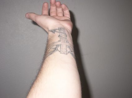 Cross Tat On Wrist